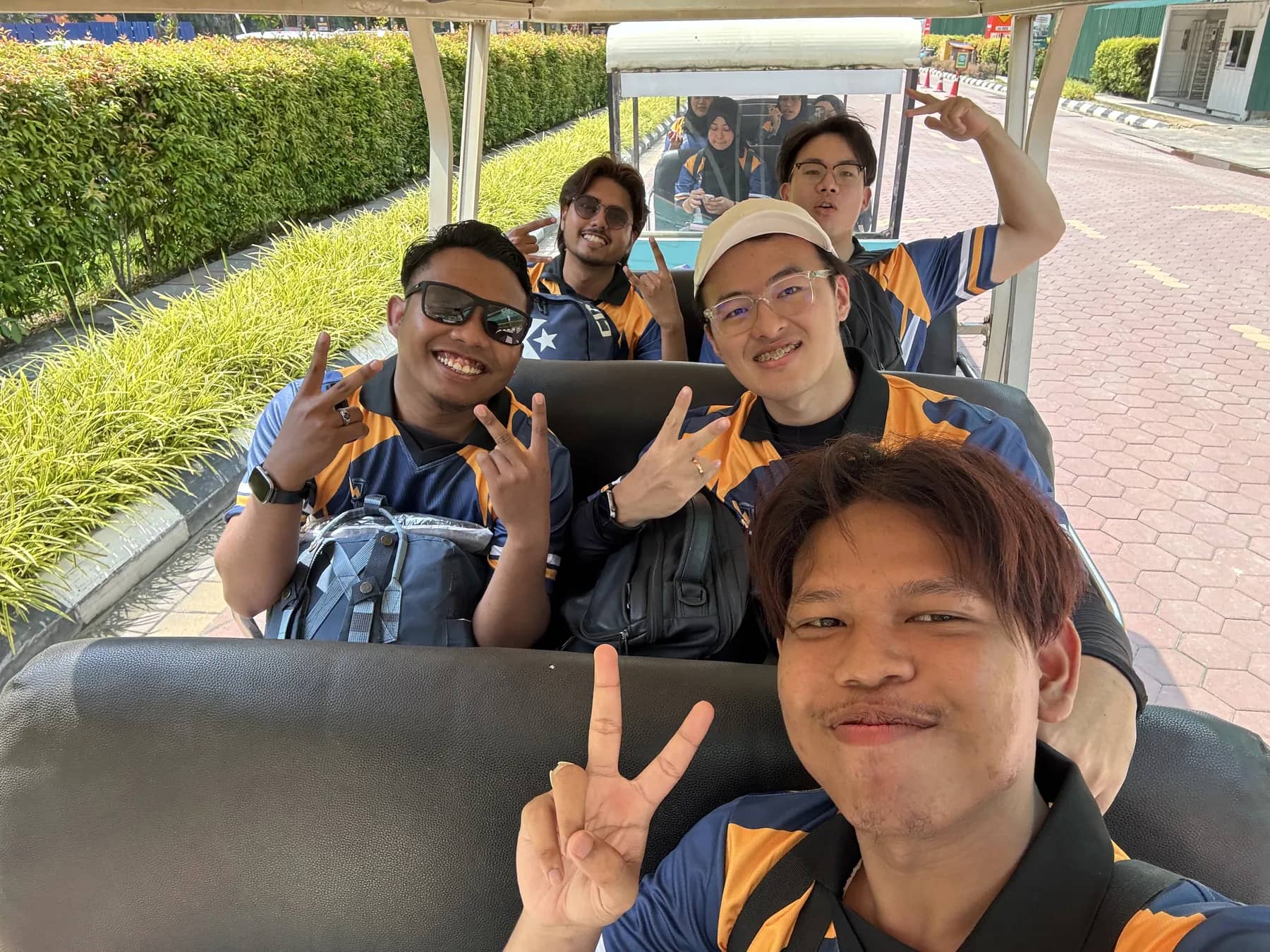 Team members laughing on a buggy ride