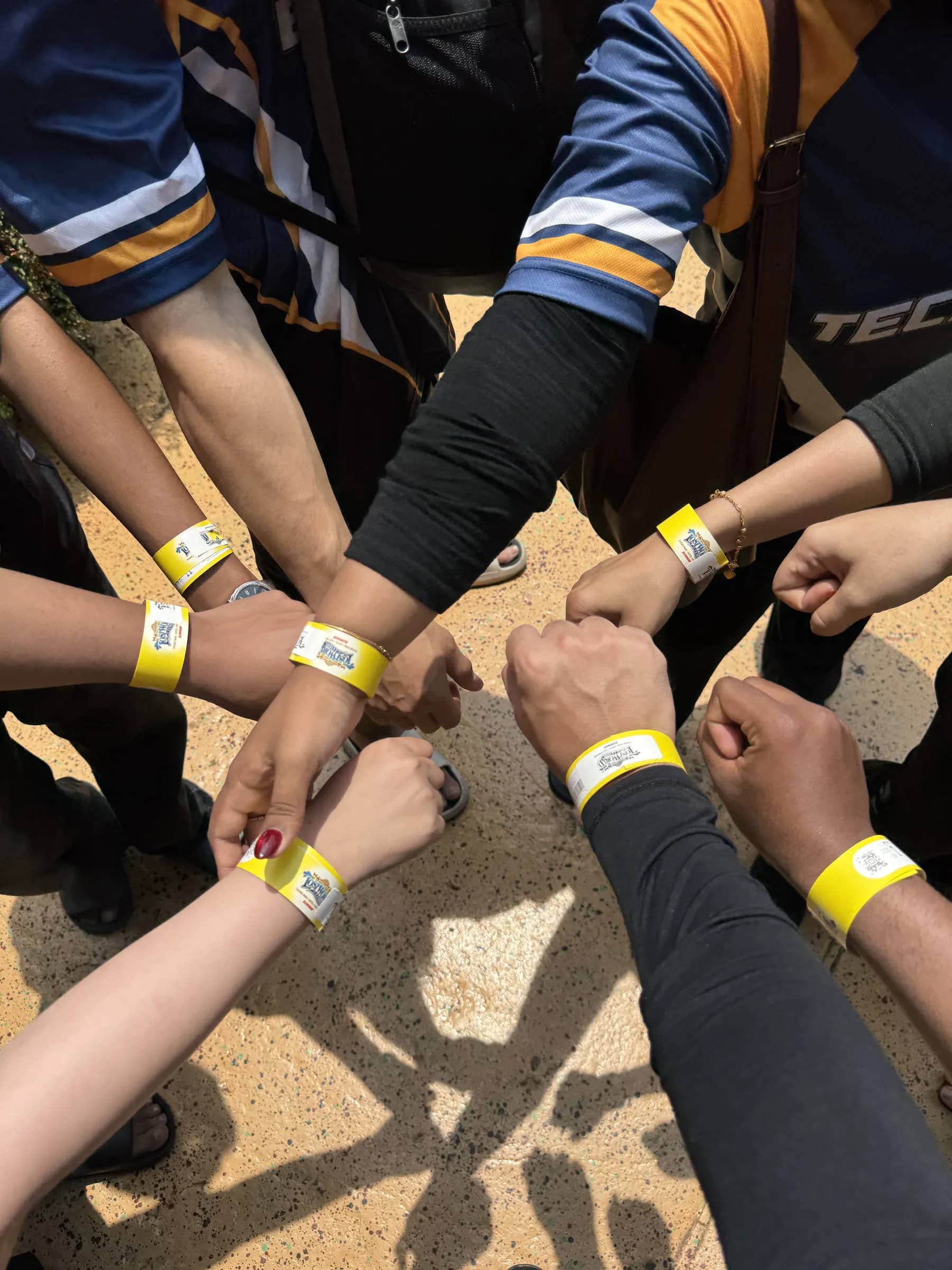 Team hands together in a huddle